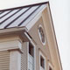 detail of exterior-roof, decrotive window, and molding
